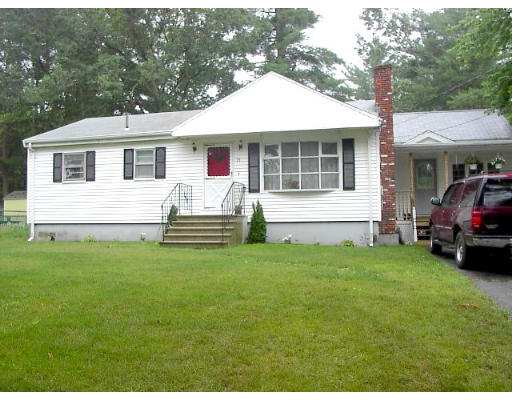 18 Jordan Road Billerica, MA 01821 - Photo 1 of 9 a view of a house with a backyard