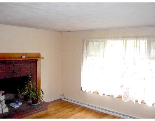 18 Jordan Road Billerica, MA 01821 - Photo 4 of 9 a view of empty room with floor to ceiling window and floor to ceiling window