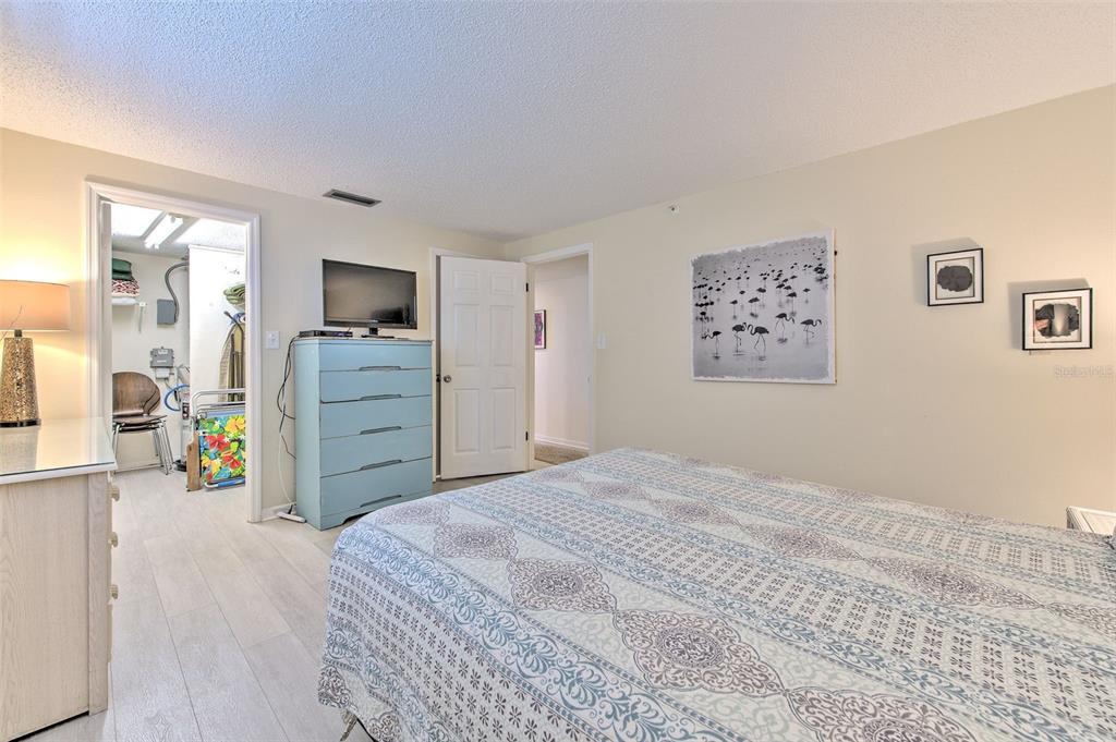 17200 Gulf Boulevard, Unit 401 North Redington Beach, FL 33708 - Photo 17 of 56 a bedroom with a bed and furniture