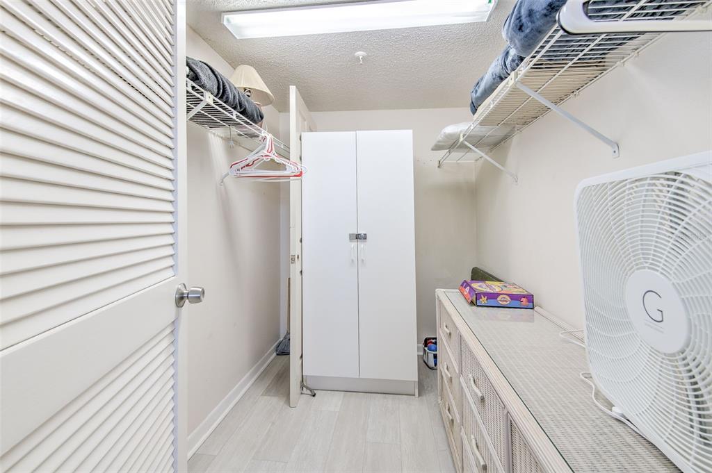 17200 Gulf Boulevard, Unit 401 North Redington Beach, FL 33708 - Photo 25 of 56 a storage room with a washer and dryer