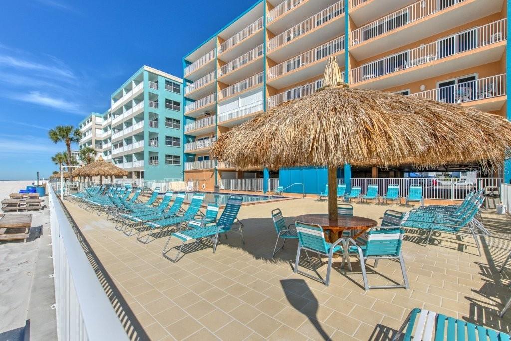 17200 Gulf Boulevard, Unit 401 North Redington Beach, FL 33708 - Photo 52 of 56 a view of a chairs and tables in the patio