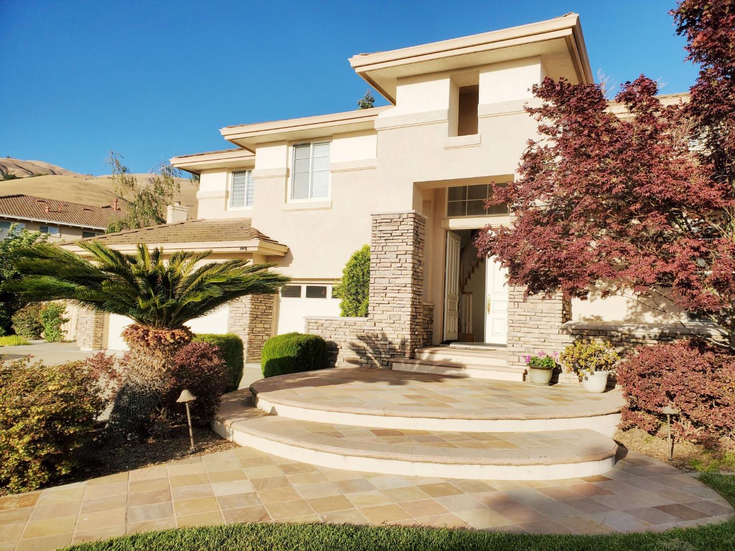 a view of a building with a yard