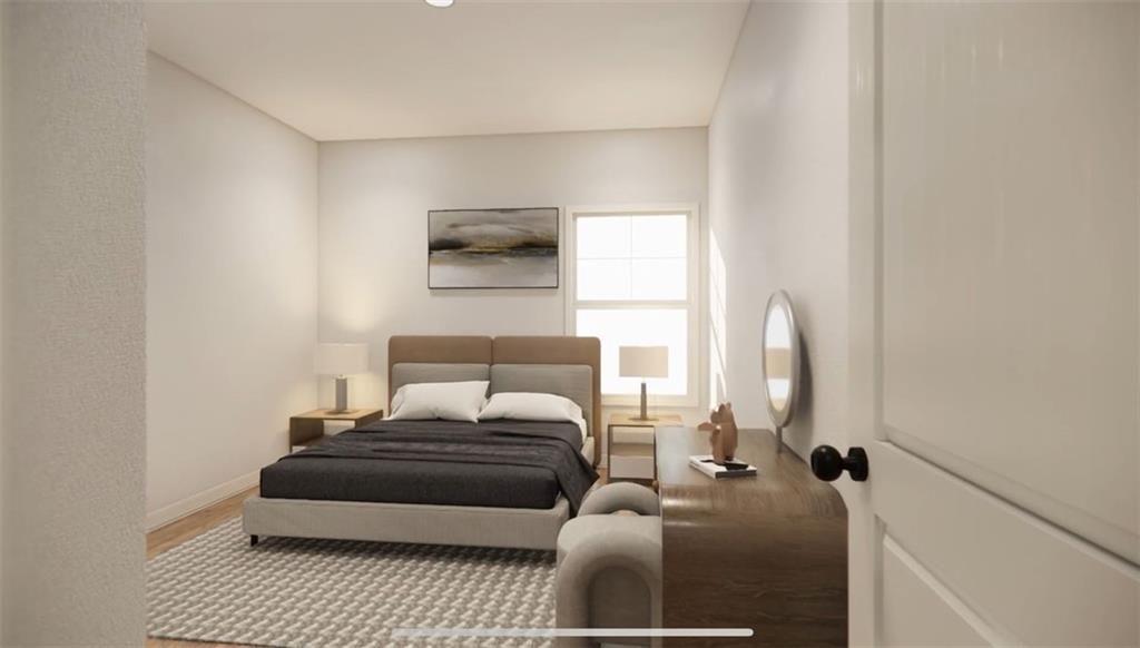 42 Dogwood Street Northeast Rome, GA 30161 - Photo 13 of 34 a bedroom with bed and a window