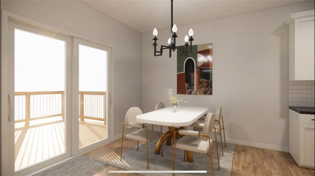 42 Dogwood Street Northeast Rome, GA 30161 - Photo 14 of 34 a view of a dining room with furniture wooden floor and a chandelier