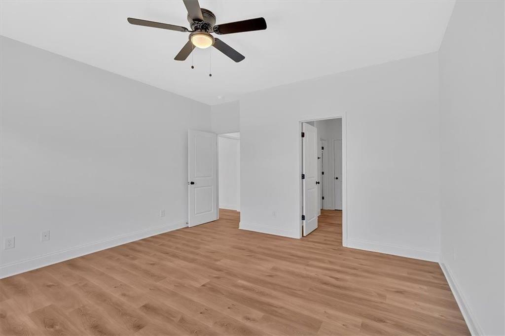 42 Dogwood Street Northeast Rome, GA 30161 - Photo 31 of 34 a view of empty room with wooden floor