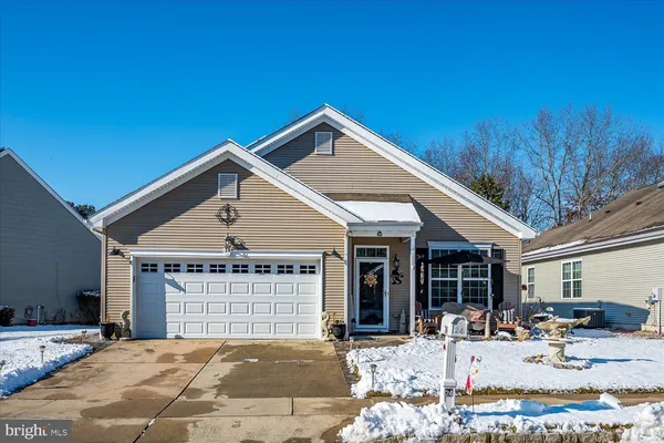 a front view of a house with patio