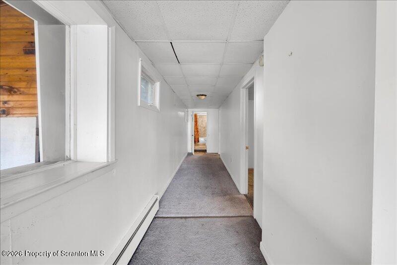 1228 Lake Road Factoryville, PA 18419 - Photo 9 of 43 a view of a hallway with wooden floor and entryway