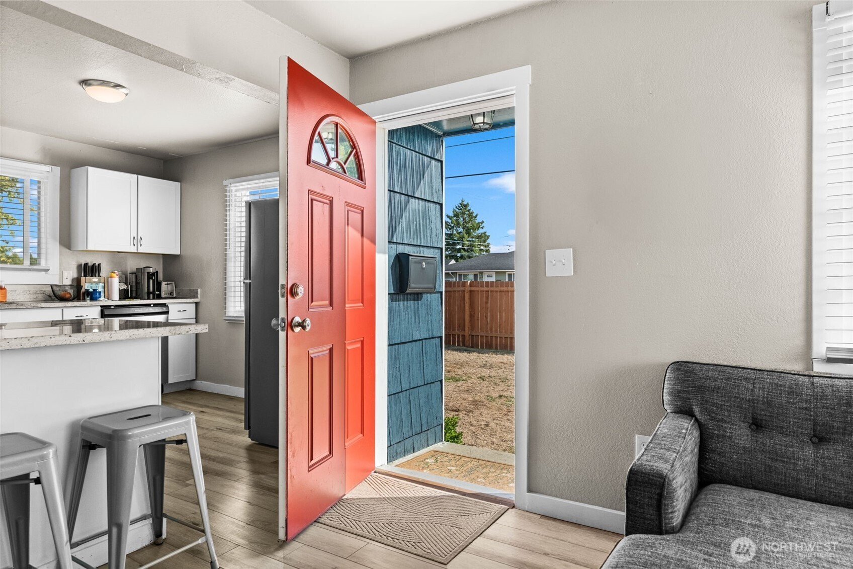 2719 South 70th Street Tacoma, WA 98409 - Photo 2 of 40 a view of kitchen with stainless steel appliances granite countertop cabinets and a counter top space