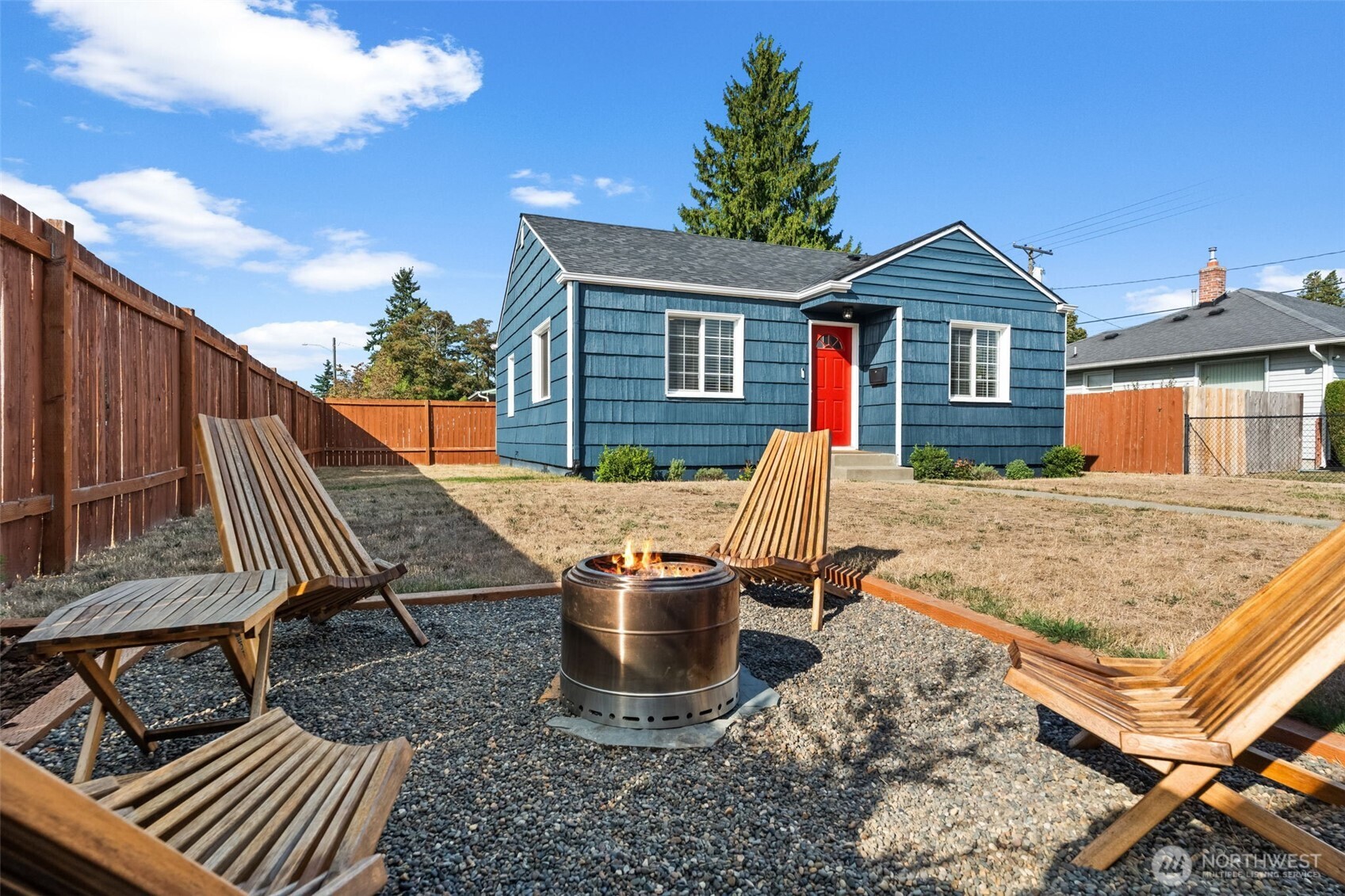 2719 South 70th Street Tacoma, WA 98409 - Photo 26 of 40 a view of a patio with a table and chairs