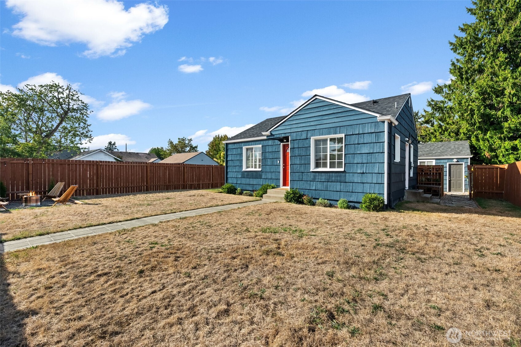 2719 South 70th Street Tacoma, WA 98409 - Photo 27 of 40 a front view of a house with a yard