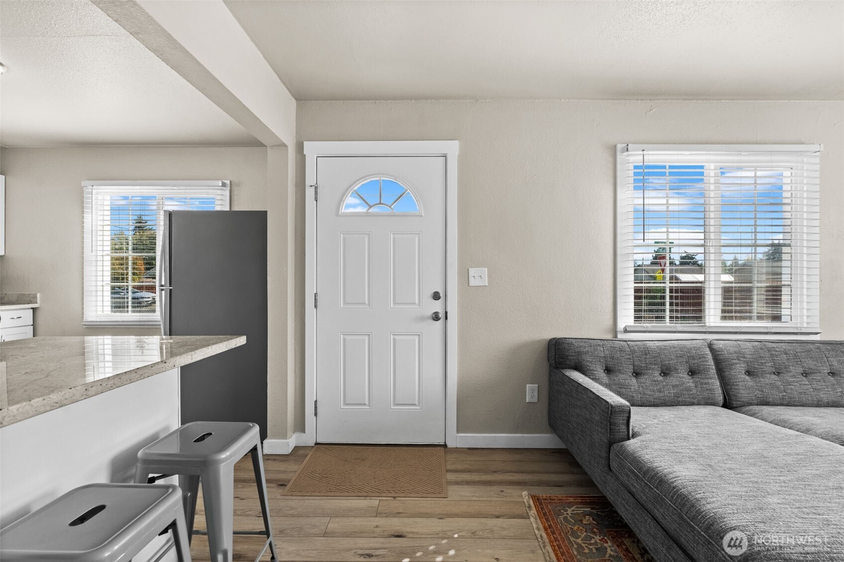 2719 South 70th Street Tacoma, WA 98409 - Photo 3 of 40 a living room with furniture and a window