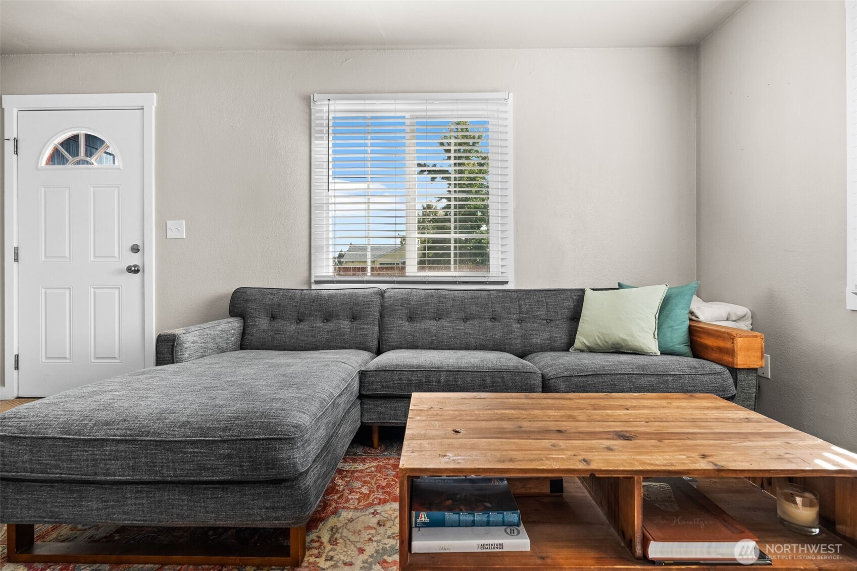 2719 South 70th Street Tacoma, WA 98409 - Photo 5 of 40 a bedroom with a bed and a couch