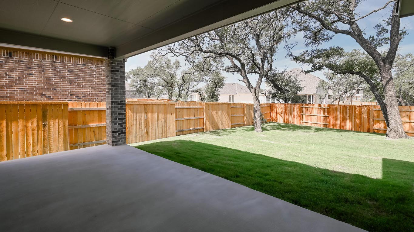 368 Prickly Poppy Loop Kyle, TX 78640 - Photo 15 of 39 Fenced backyard with a patio