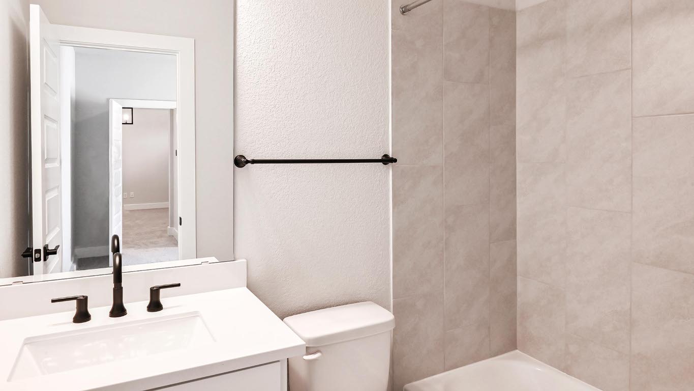 368 Prickly Poppy Loop Kyle, TX 78640 - Photo 19 of 39 Full bath featuring vanity, shower / bath combination, and a textured wall