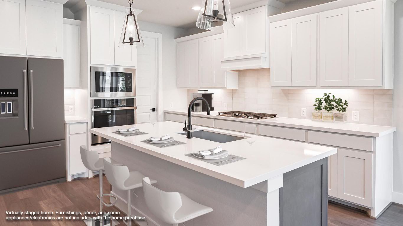 368 Prickly Poppy Loop Kyle, TX 78640 - Photo 3 of 39 Kitchen with appliances with stainless steel finishes, dark wood-style flooring, decorative backsplash, white cabinetry, and recessed lighting