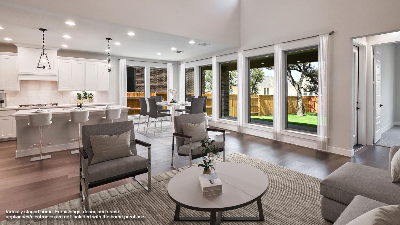 368 Prickly Poppy Loop Kyle, TX 78640 - Photo 4 of 39 Living area with recessed lighting and wood finished floors