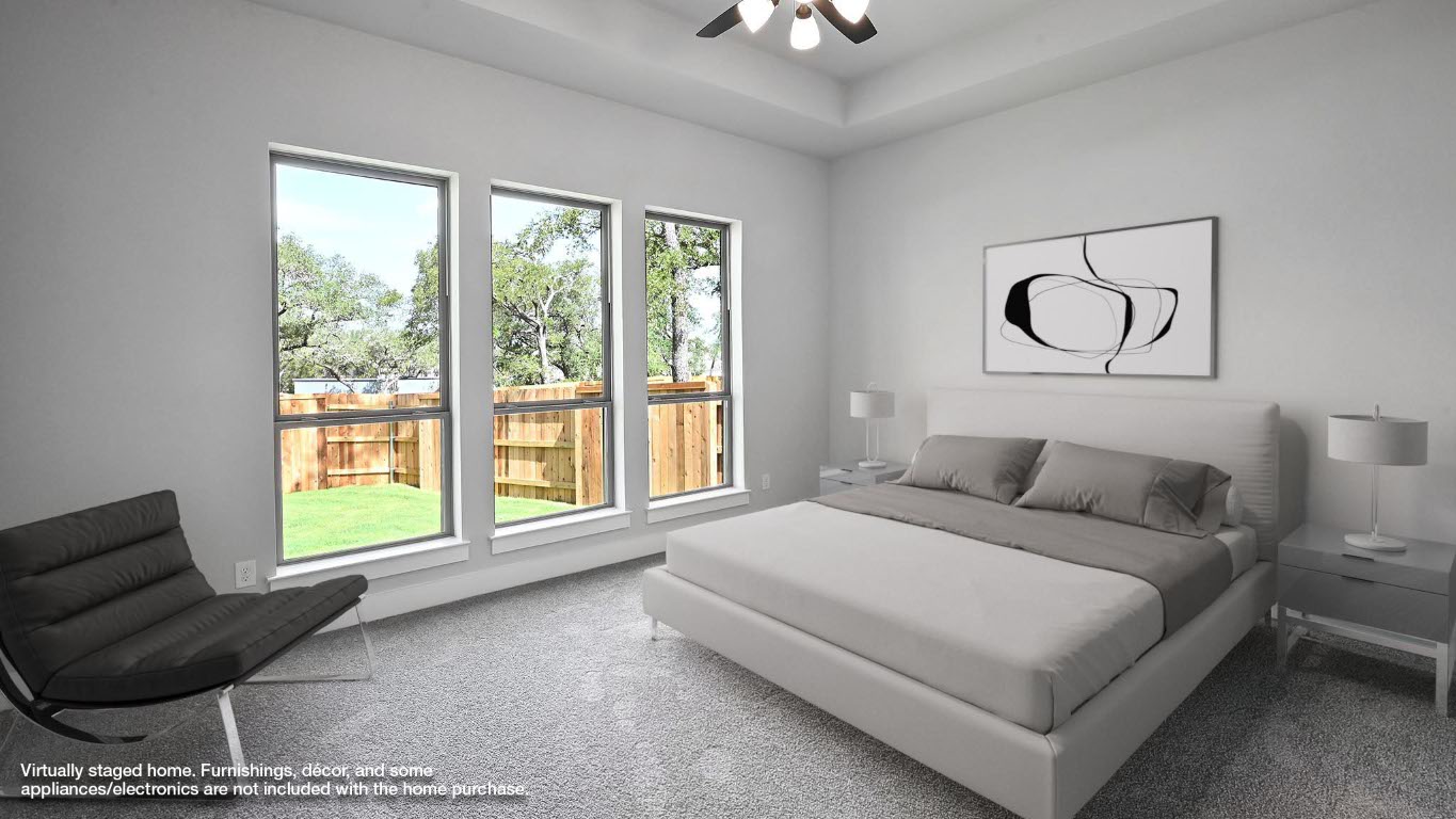 368 Prickly Poppy Loop Kyle, TX 78640 - Photo 5 of 39 Carpeted bedroom featuring ceiling fan