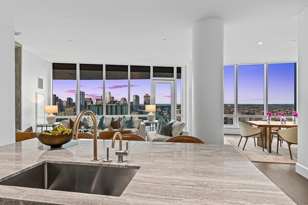 40 Trinity Place, Unit PH35D Boston, MA 02116 - Photo 11 of 40 a kitchen with a sink and a large window