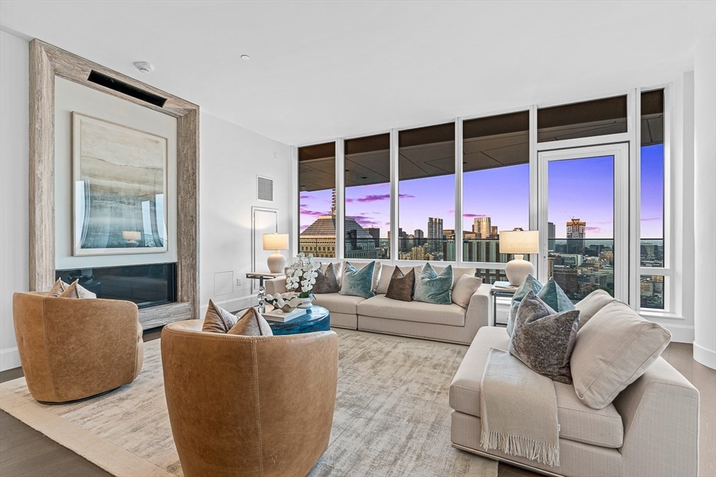 40 Trinity Place, Unit PH35D Boston, MA 02116 - Photo 13 of 40 a living room with furniture ceiling fan and a window