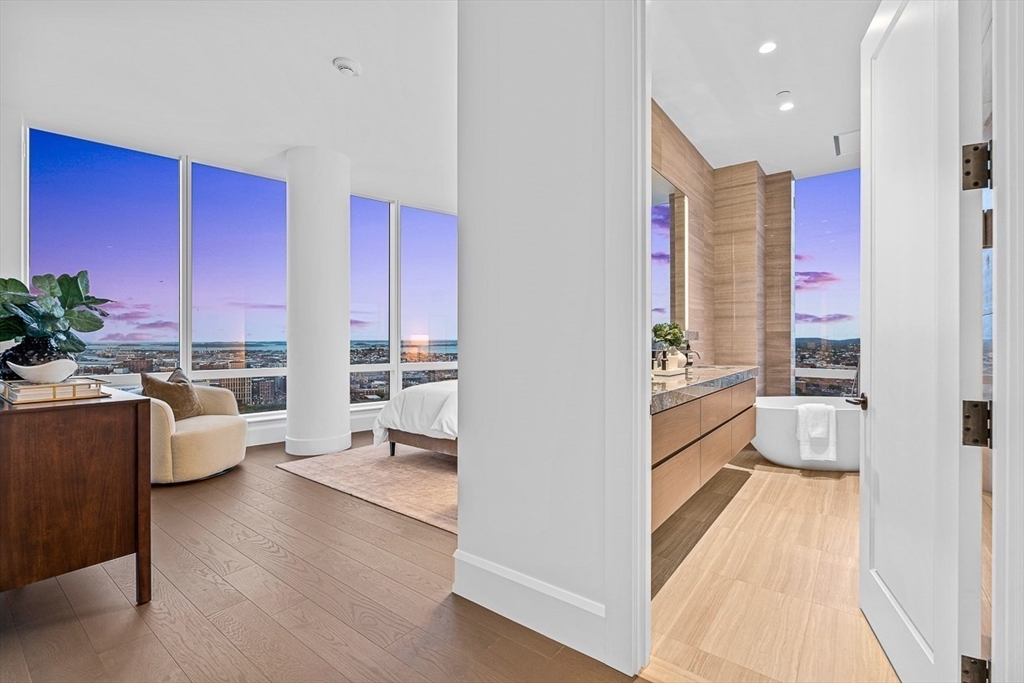 40 Trinity Place, Unit PH35D Boston, MA 02116 - Photo 25 of 40 a view of living room filled with furniture and a large window