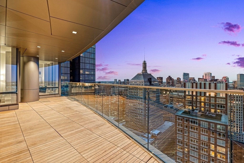 40 Trinity Place, Unit PH35D Boston, MA 02116 - Photo 4 of 40 a view of swimming pool with outdoor seating and city view