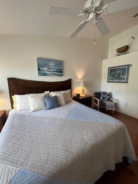 5270 Hyland Hills Avenue, Unit 1724 Sarasota, FL 34241 - Photo 20 of 35 a bedroom with bed and window