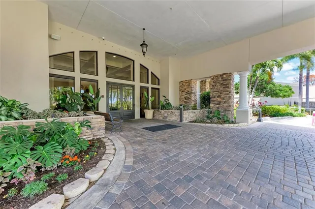a very nice looking living room with furniture and a chandelier