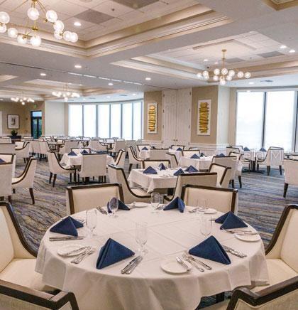 5270 Hyland Hills Avenue, Unit 1724 Sarasota, FL 34241 - Photo 34 of 35 a very nice looking living room with furniture and a chandelier