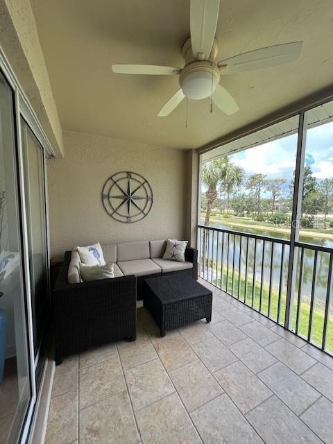 5270 Hyland Hills Avenue, Unit 1724 Sarasota, FL 34241 - Photo 9 of 35 a living room with furniture and a large window