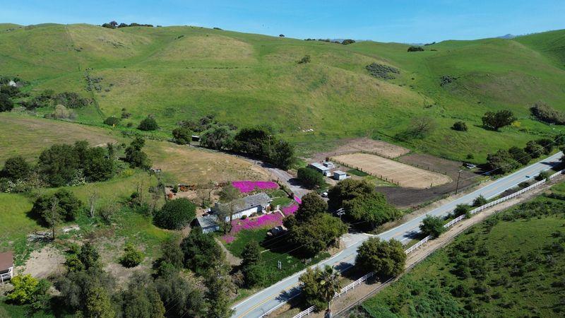 3463 Calaveras Road Milpitas, CA 95035 - Photo 2 of 15 an aerial view of green landscape with trees houses and mountain view