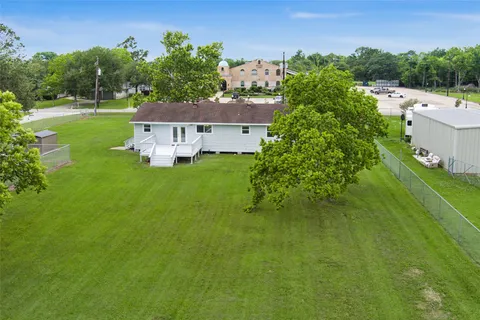 a aerial view of a house with a garden
