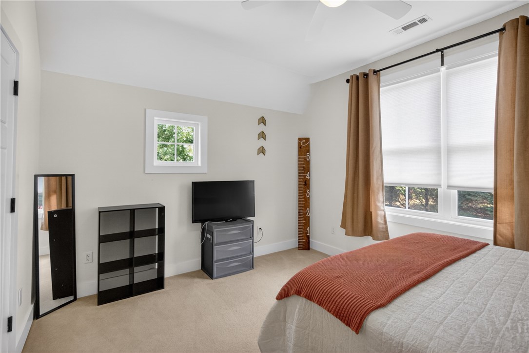 1504 Double Springs Road Townville, SC 29689 - Photo 31 of 41 This cozy bedroom features plush carpeting and abundant natural light.