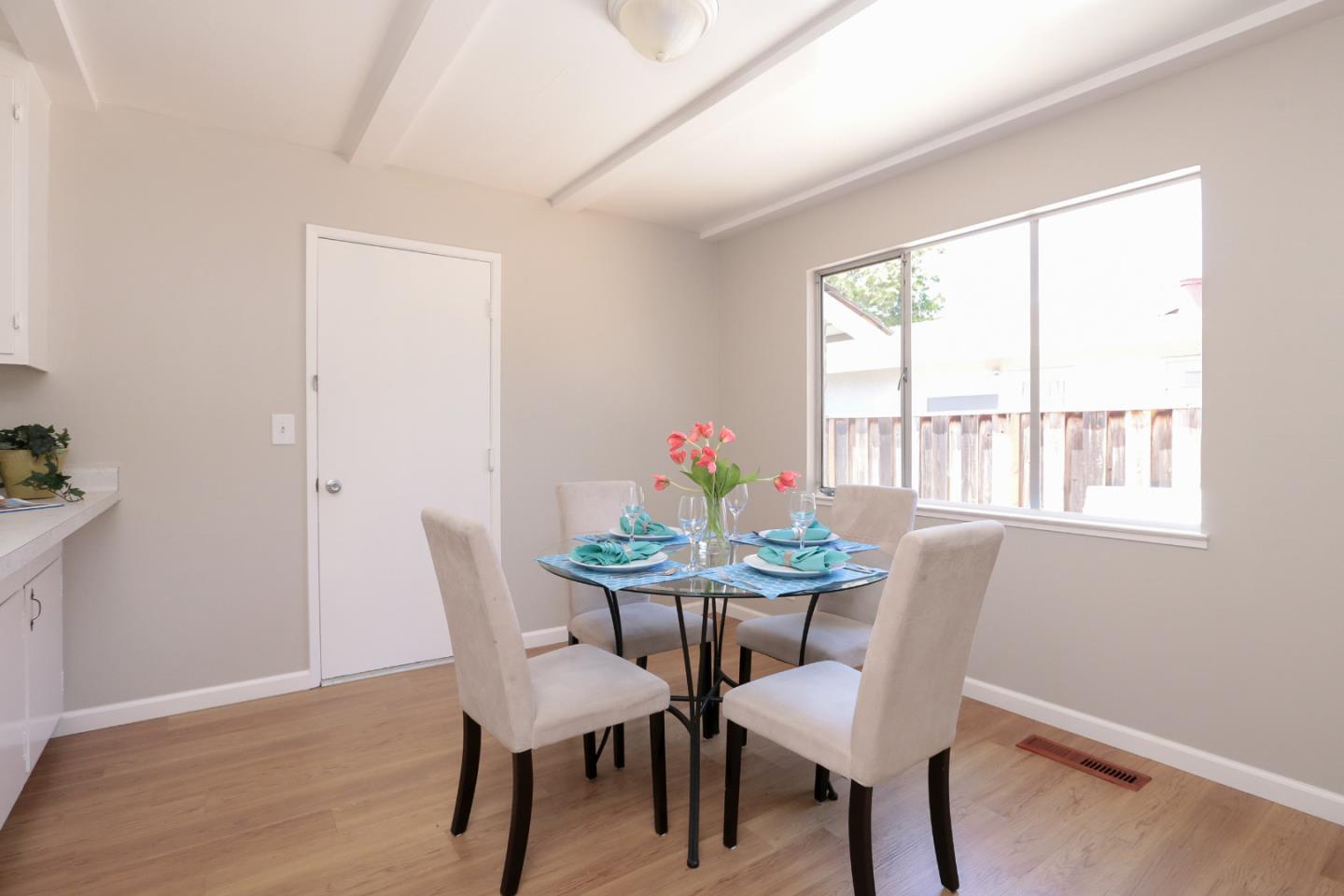 979 West Homestead Road Sunnyvale, CA 94087 - Photo 11 of 16 a view of a dining room with furniture window and outside view