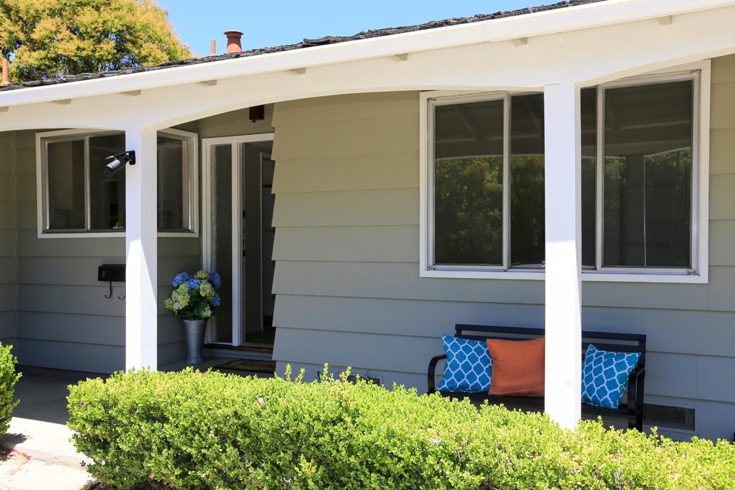 979 West Homestead Road Sunnyvale, CA 94087 - Photo 2 of 16 a front view of a house with glass windows