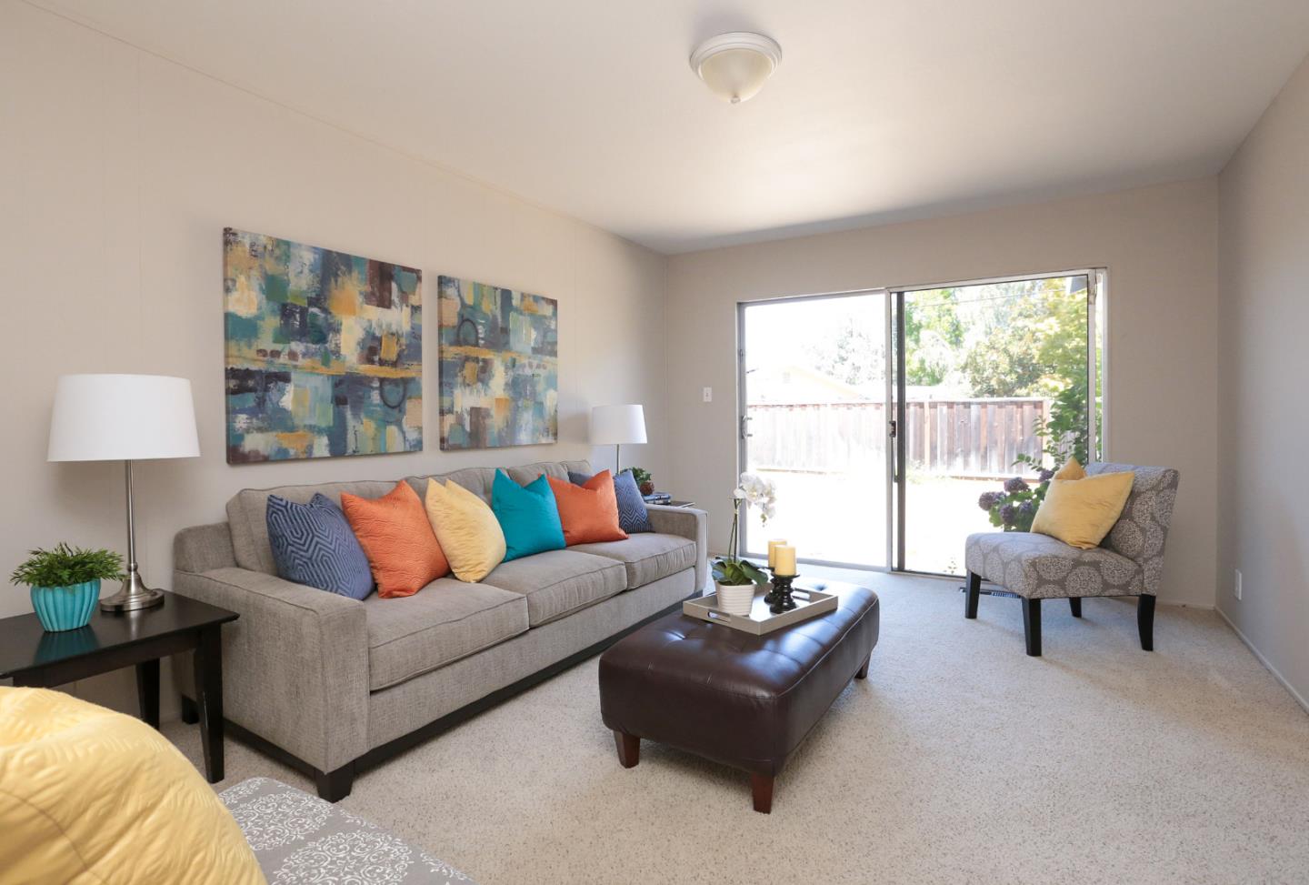 979 West Homestead Road Sunnyvale, CA 94087 - Photo 6 of 16 a living room with furniture and a large window