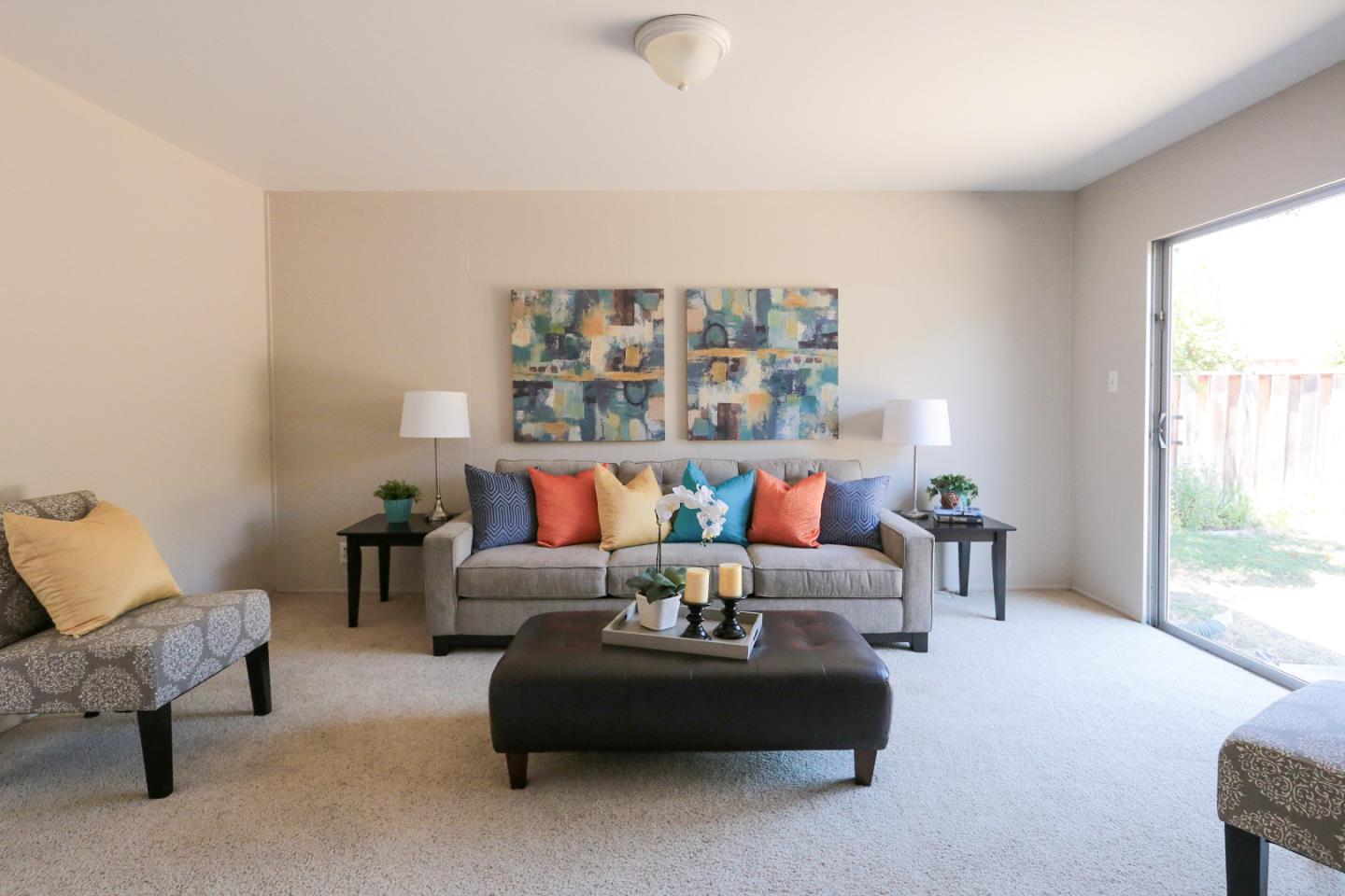 979 West Homestead Road Sunnyvale, CA 94087 - Photo 7 of 16 a living room with furniture and a large window