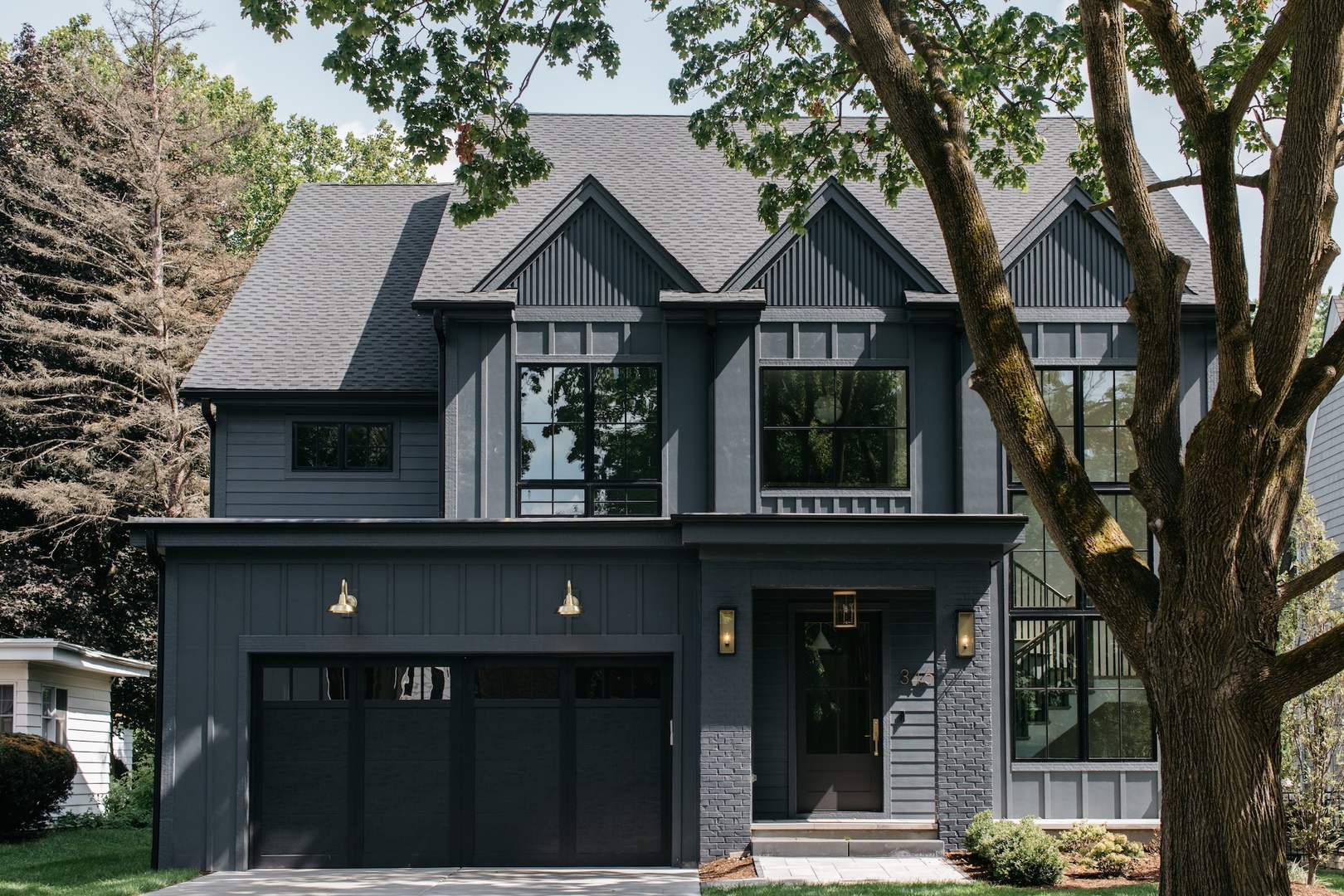 905 North Webster Street Naperville, IL 60563 - Photo 3 of 13 a front view of a house with balcony