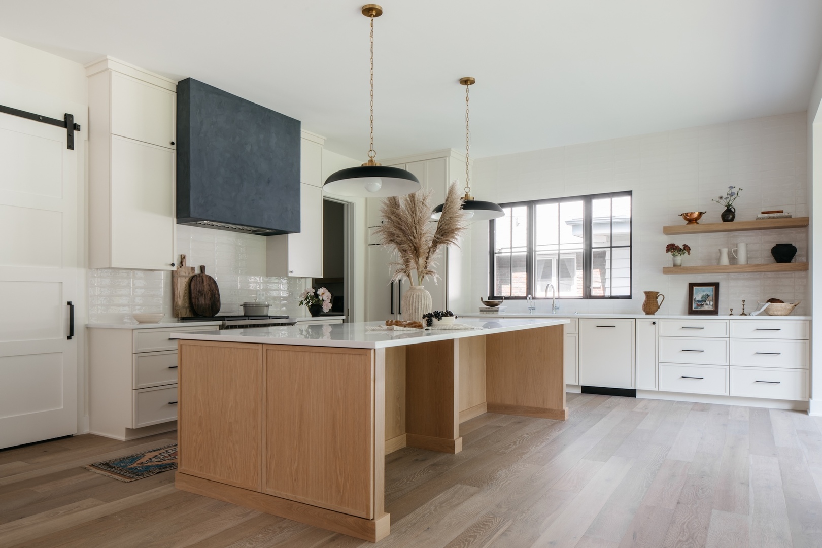 905 North Webster Street Naperville, IL 60563 - Photo 7 of 13 a kitchen with appliances a sink and cabinets