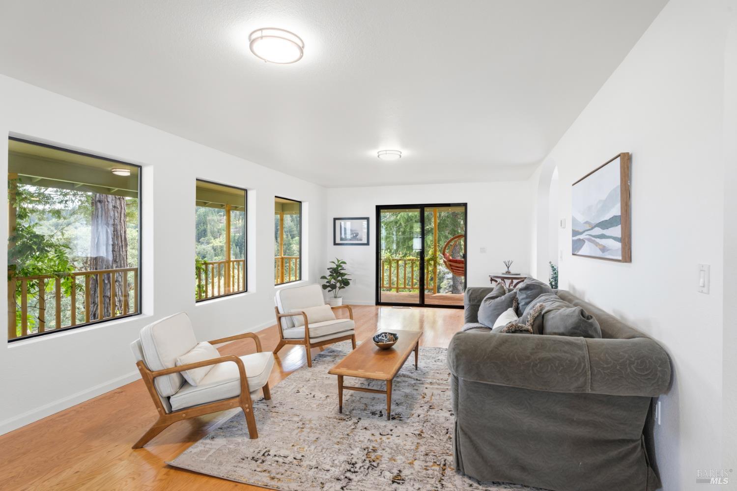 1455 Oak Knoll Road Ukiah, CA 95482 - Photo 7 of 56 The living room has a wall of windows to take in the sights.