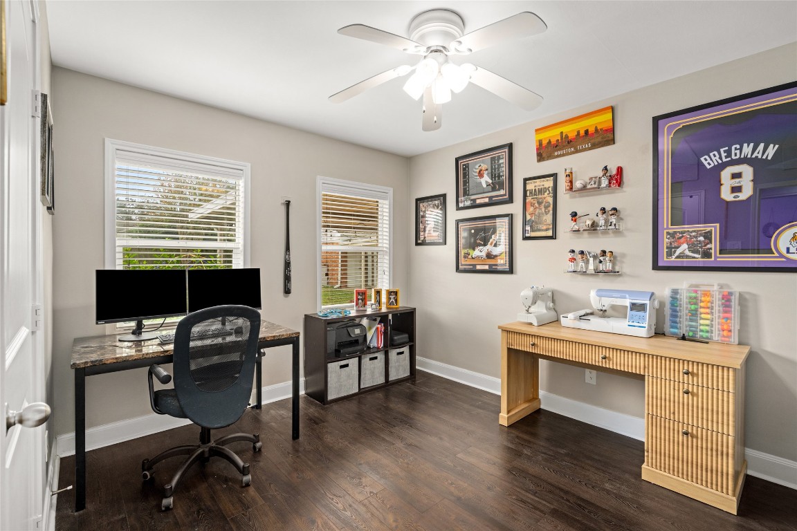 7805 Valley View Lane Houston, TX 77074 - Photo 18 of 29 a view of a workspace with furniture and a window