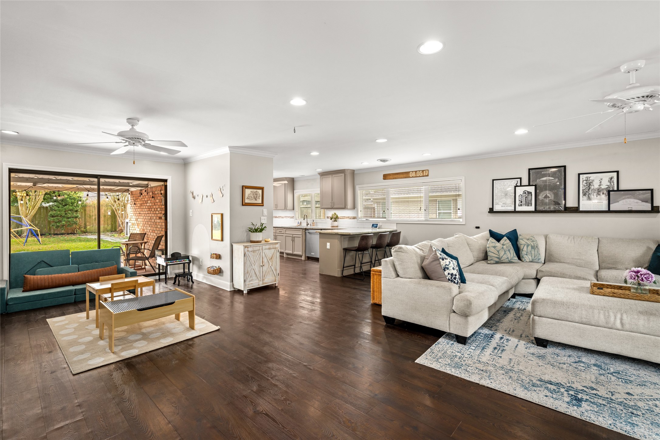 7805 Valley View Lane Houston, TX 77074 - Photo 9 of 29 a living room with furniture and a large window