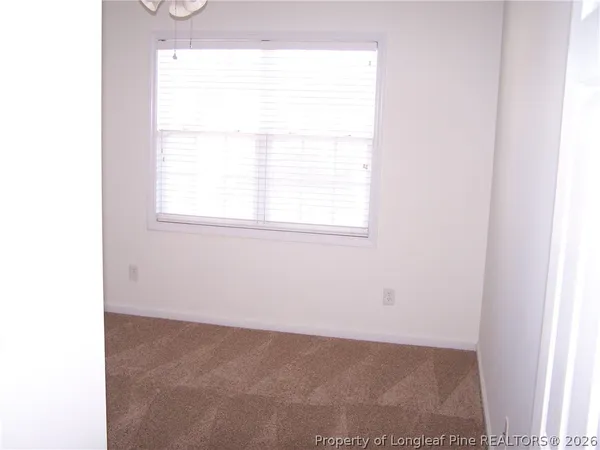 a view of a room that has a window in it
