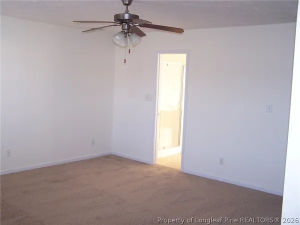 a view of a small space with a fan