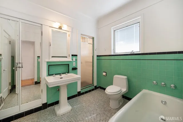 a bathroom with a sink and toilet