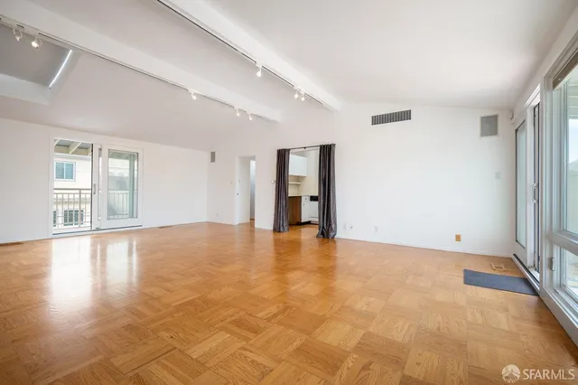 a view of an empty walk in closet