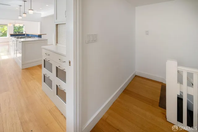 a view of hallway with closet