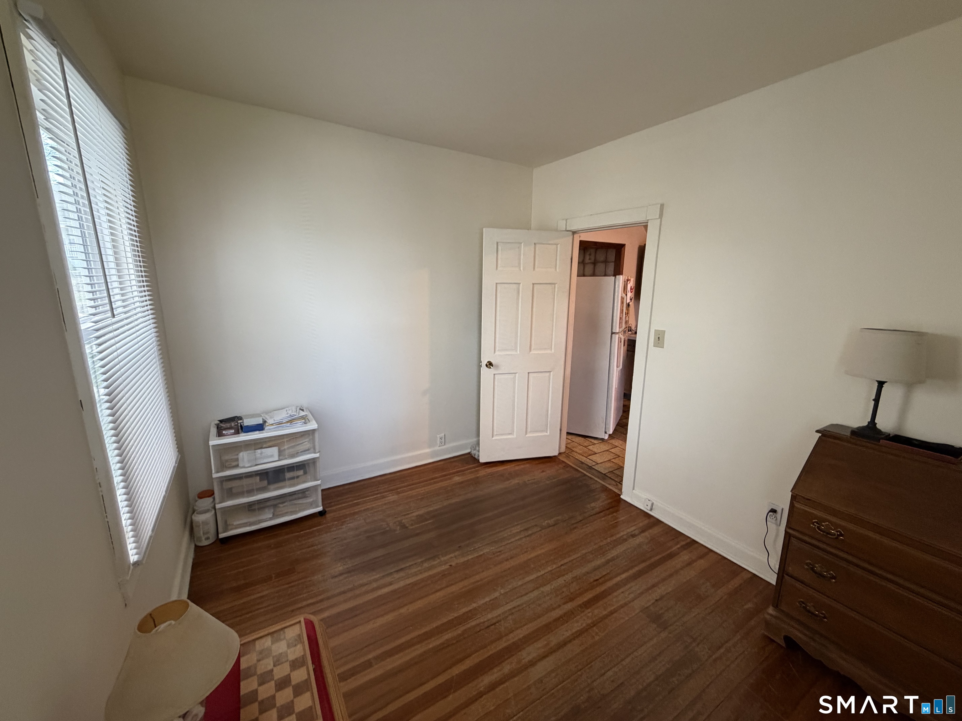 593 Wayne Street Bridgeport, CT 06606 - Photo 11 of 20 a view of an empty room and wooden floor