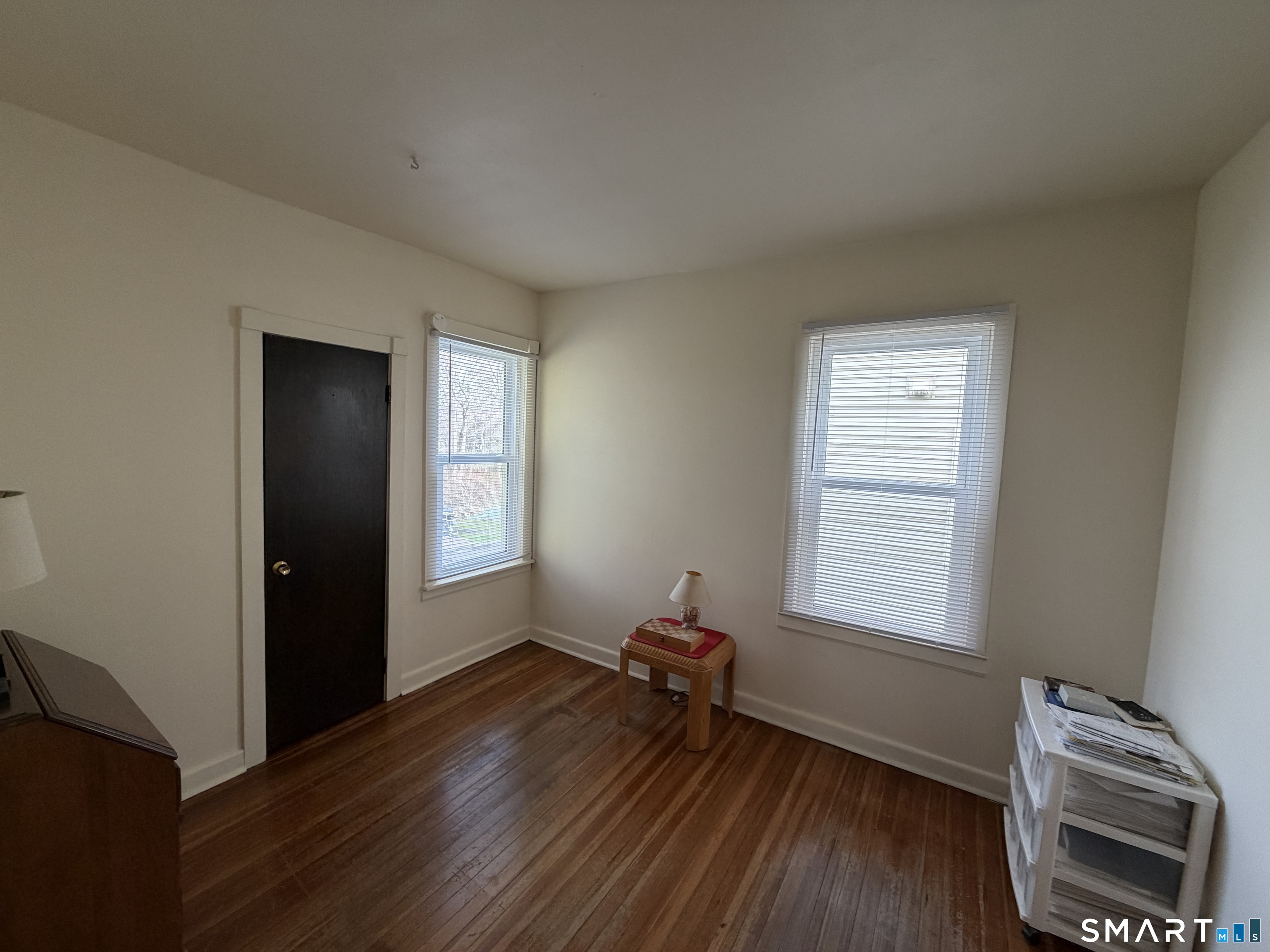 593 Wayne Street Bridgeport, CT 06606 - Photo 12 of 20 a room with furniture and a window