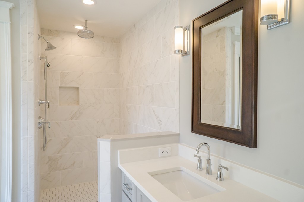 322 Maynard Road Sudbury, MA 01776 - Photo 16 of 24 a bathroom with a sink and a mirror