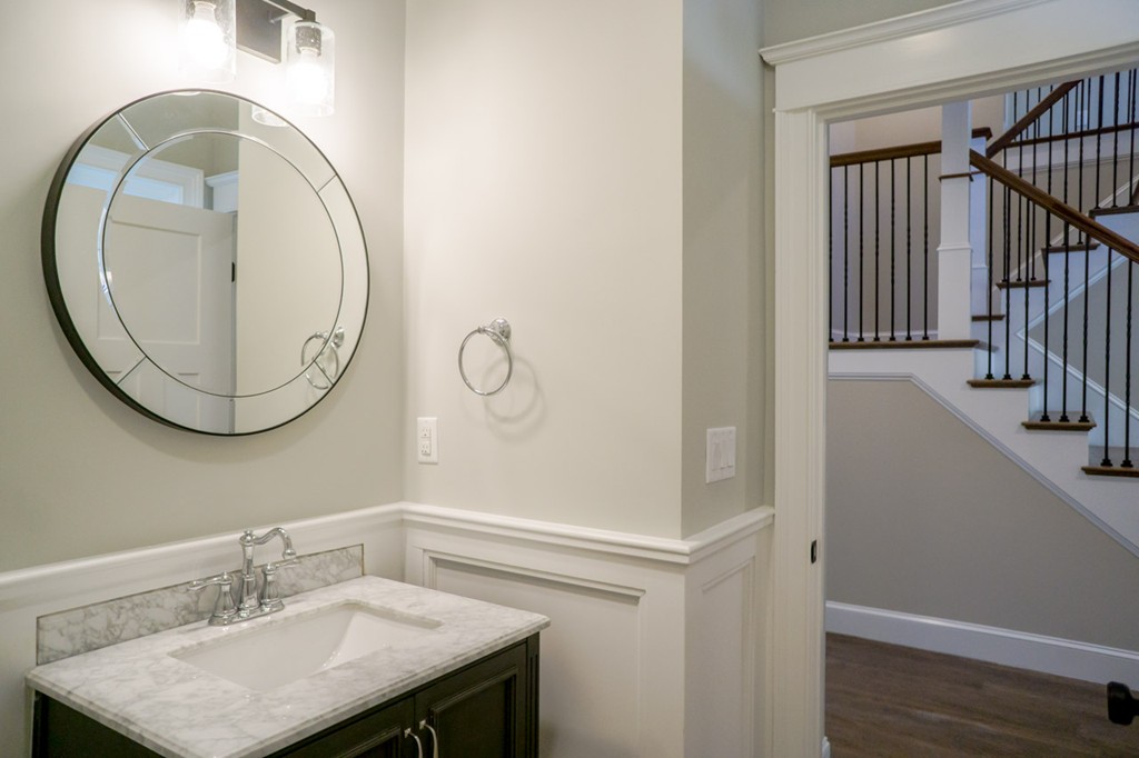 322 Maynard Road Sudbury, MA 01776 - Photo 23 of 24 a bathroom with a sink and a mirror